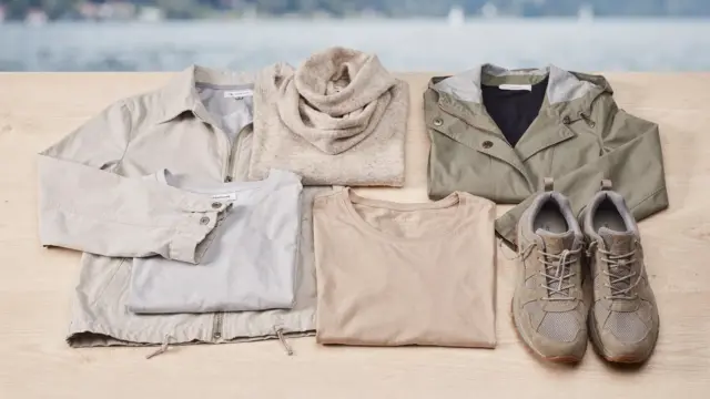 Saisonale Kleidung für den Bodensee mit Jacke, Pullover und Regenmantel